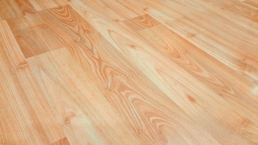 Close-up of honey oak luxury vinyl plank flooring