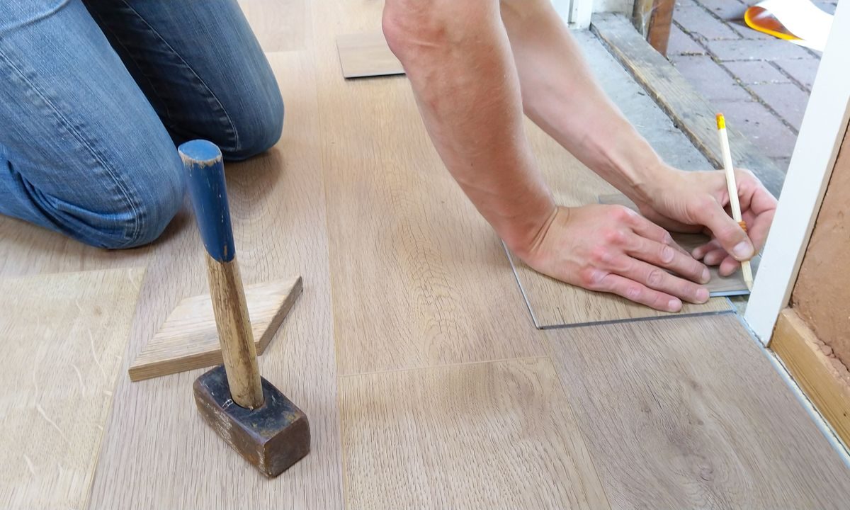 RTD Flooring installer fitting luxury vinyl plank boards